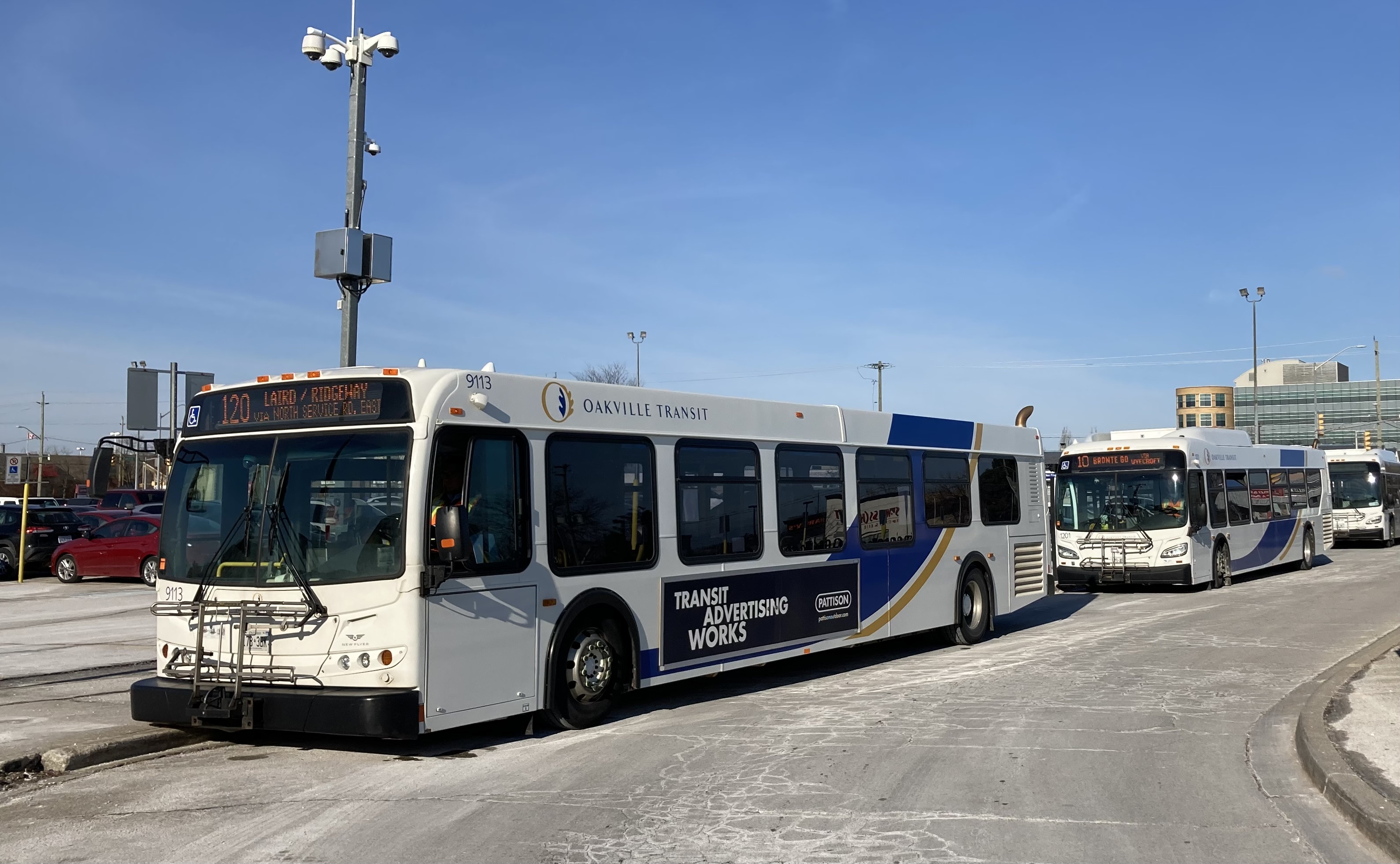 Oakville Transit buses line up at Oakville GO transportation hub | Oakville News